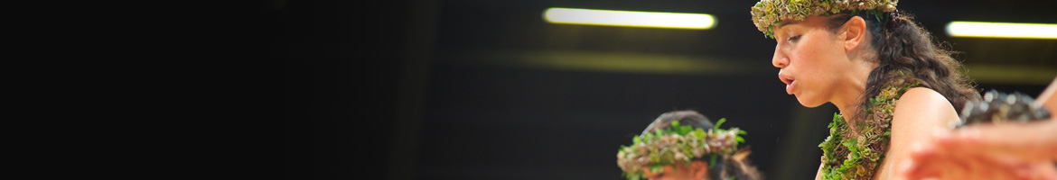 Woman wearing a Lei and a Lei Po'o